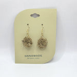 Handmade crochet flower earrings with gold hooks, cozy and creative design