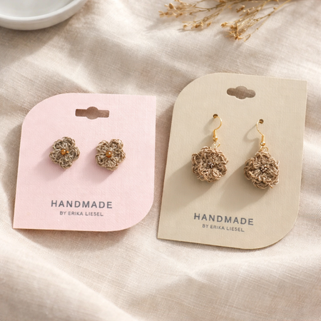 Handmade crochet flower earrings on pink and beige cards, cozy and creative gift idea