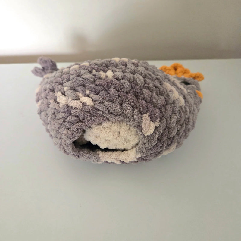 Handmade crochet owl plush with gray and white yarn, cozy and creative design