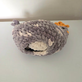 Handmade crochet owl plush with gray and white yarn, cozy and creative design