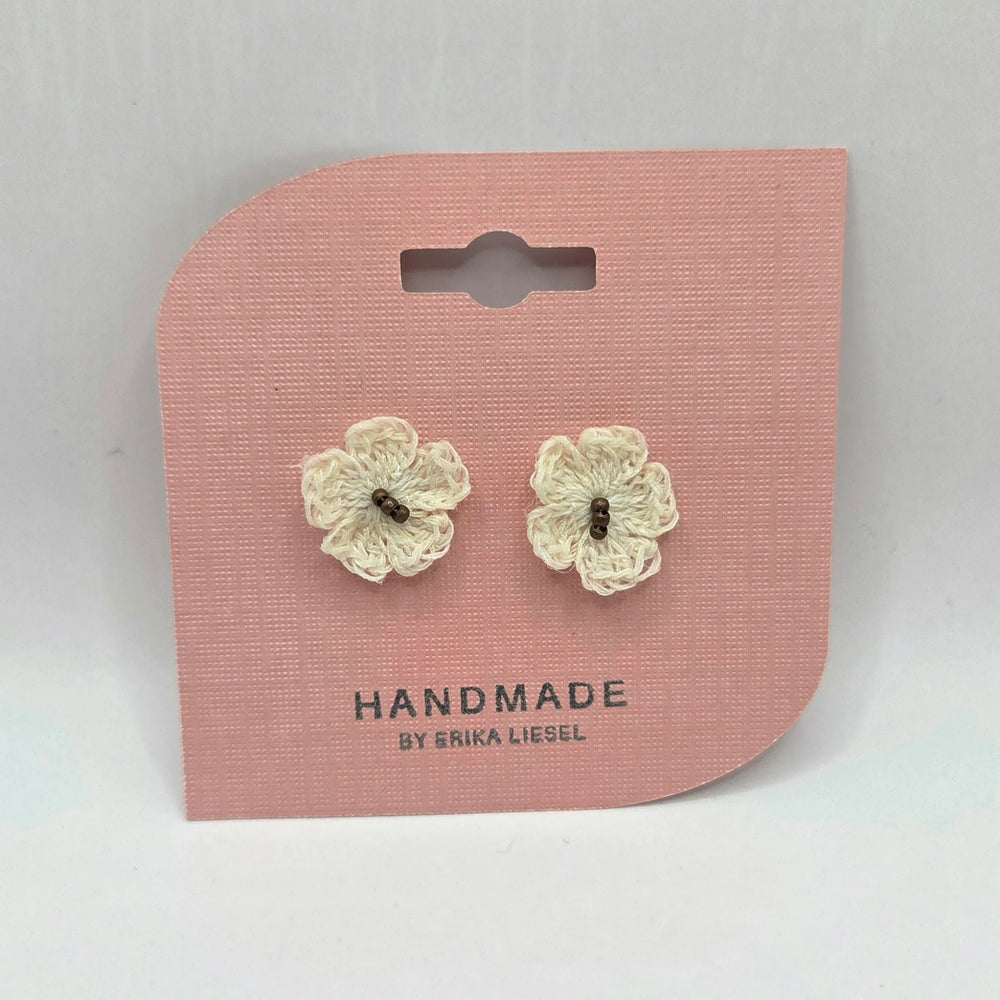 Handmade crochet flower earrings on pink card, cozy boho gift