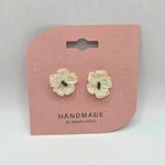 Handmade crochet flower earrings on pink card, cozy boho gift