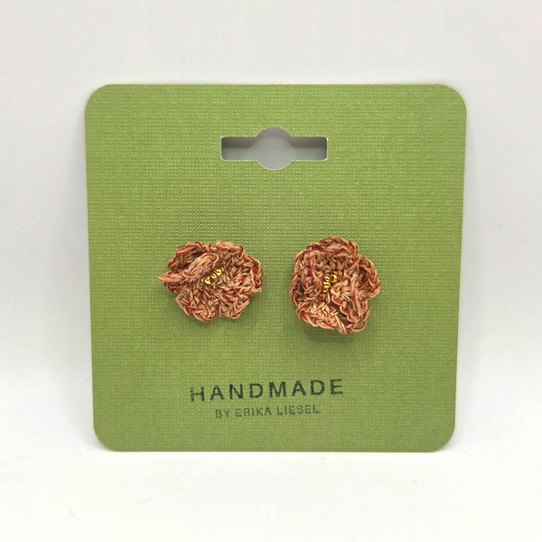 Handmade crochet flower earrings with gold beads on green card