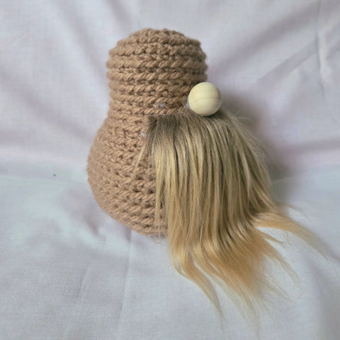 Handmade crochet gnome with blonde hair and wooden bead nose, cozy home decor