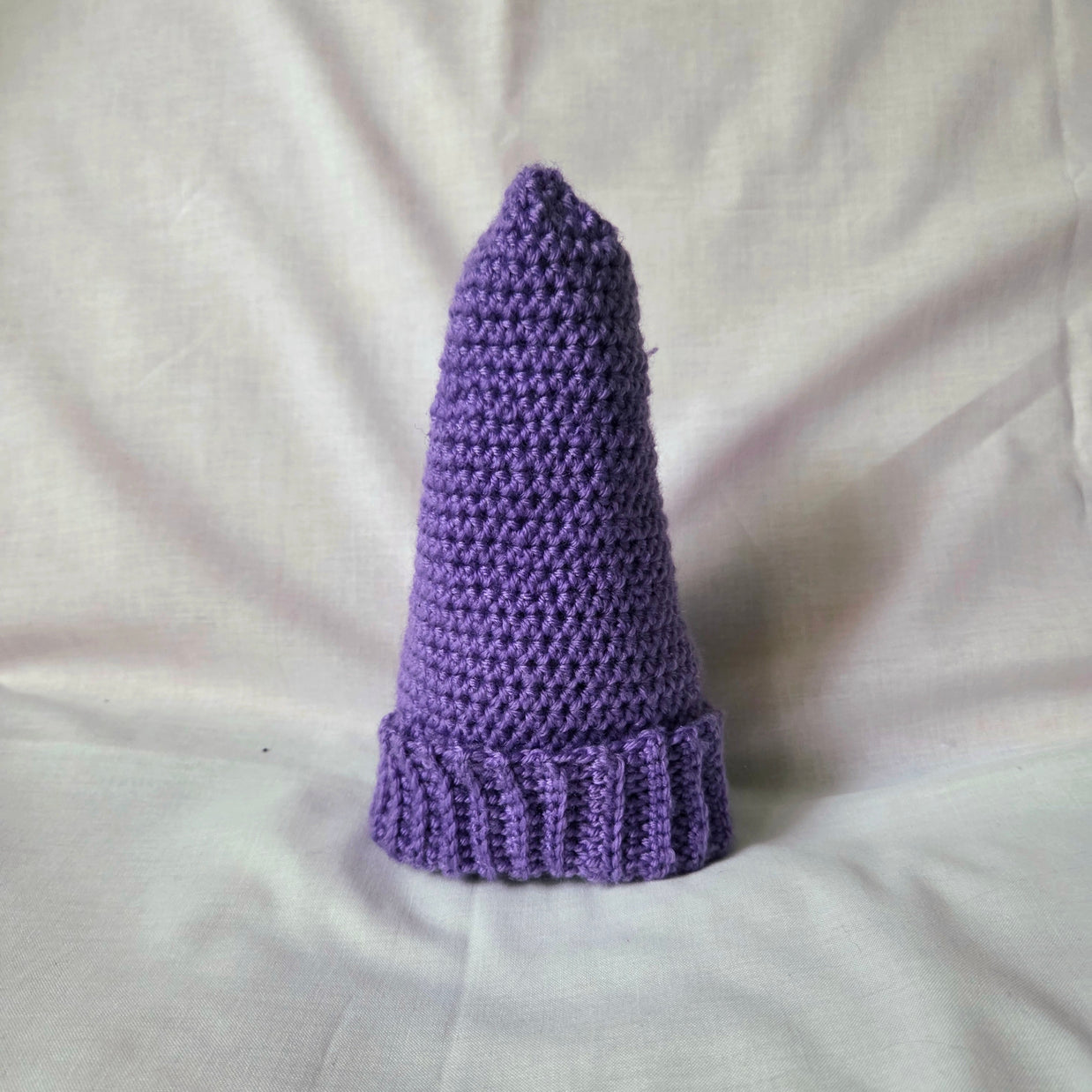 Purple crochet gnome hat with ribbed brim, handmade cozy decor