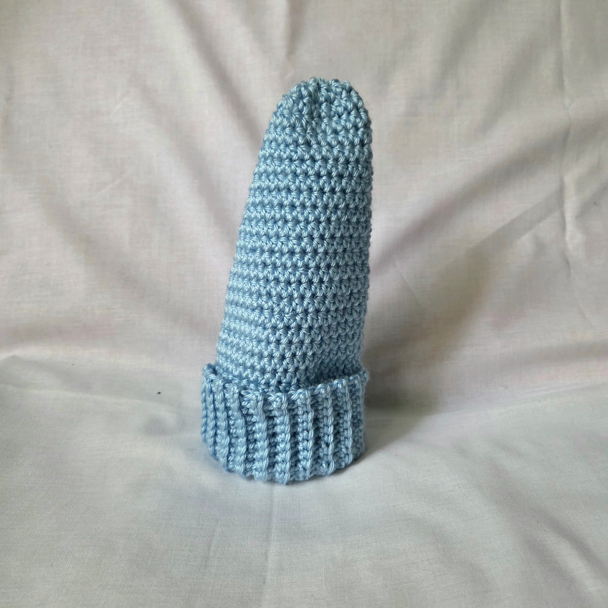 Light blue crocheted beanie with ribbed brim, handmade cozy winter hat
