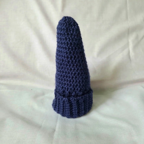 Handmade navy blue crochet gnome hat with ribbed brim, cozy winter accessory