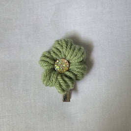 Handmade green crochet flower hair clip with sparkling center
