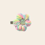 Pastel rainbow crochet flower hair clip with sparkly center, handmade cozy accessory