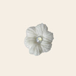 Handmade white crochet flower with pearl center, cozy craft gift