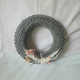 Gray crochet wreath with dried flowers and ferns, cozy handmade decor