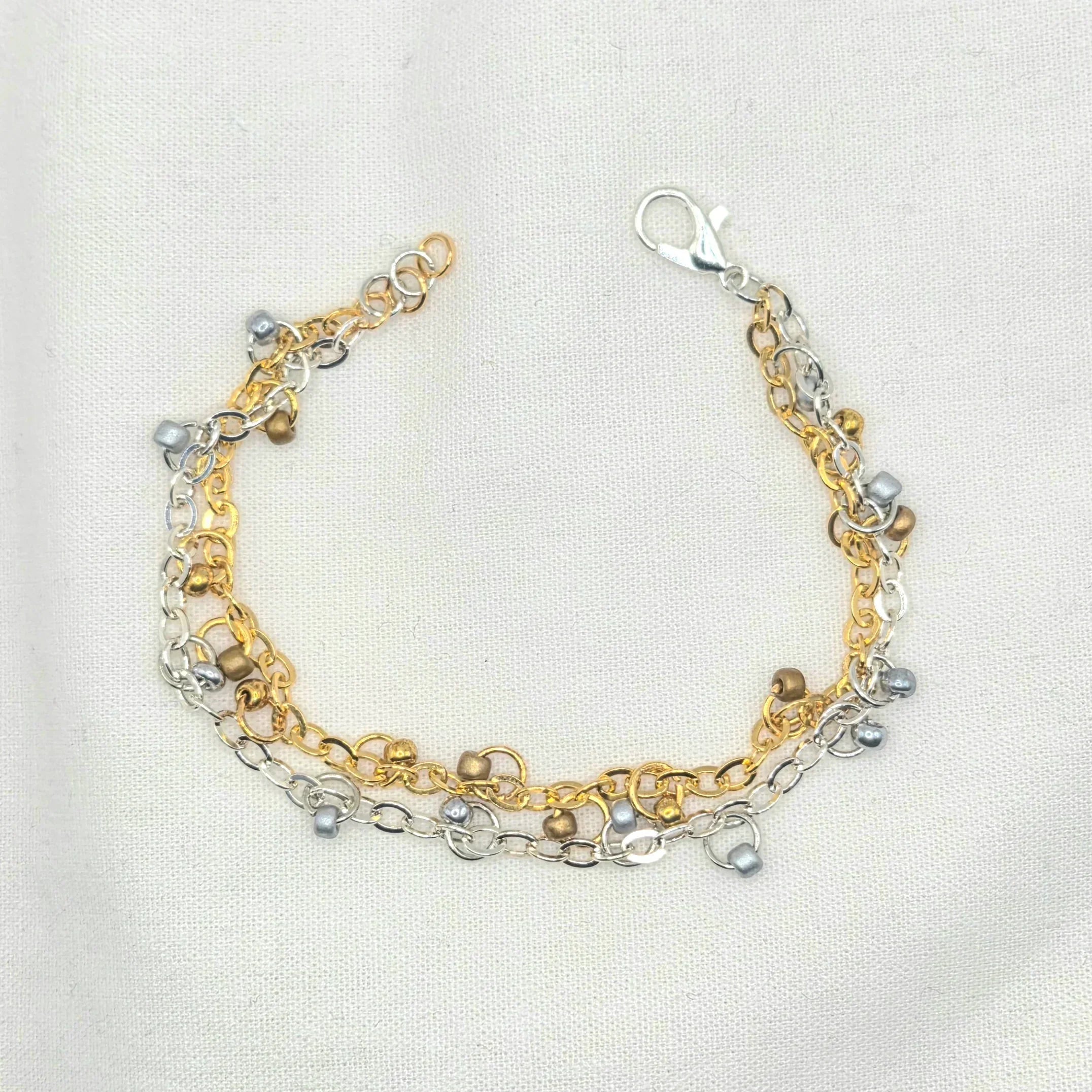Gold and silver chain bracelet with pearl accents, handmade jewelry for everyday wear