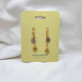 Handmade button earrings with gold chain on yellow card, cozy crochet gift idea