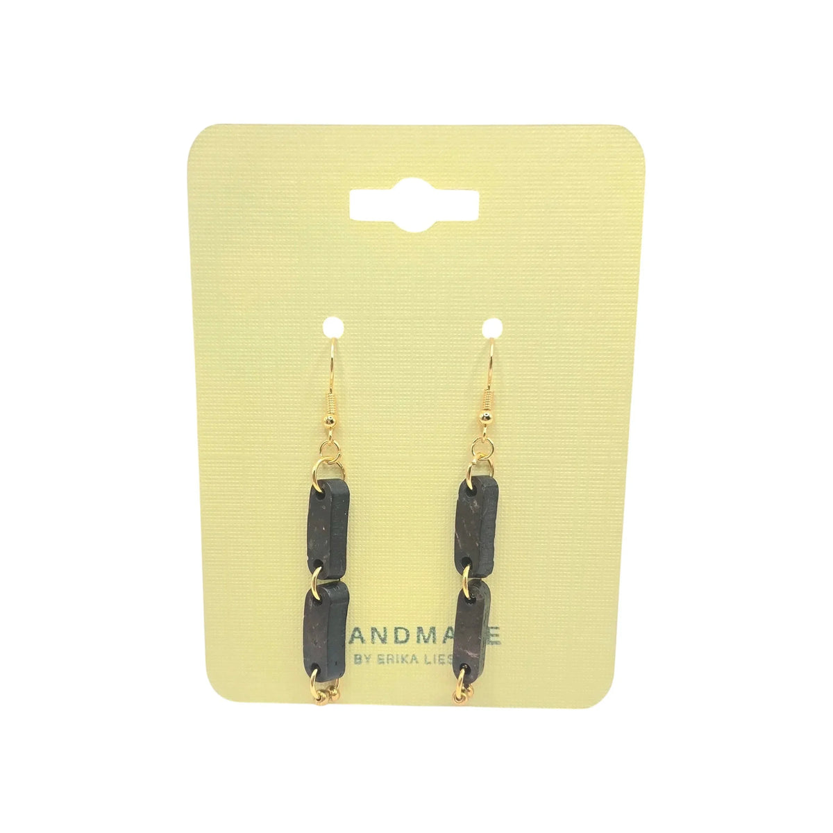 Handmade black stone dangle earrings with gold hooks on yellow card