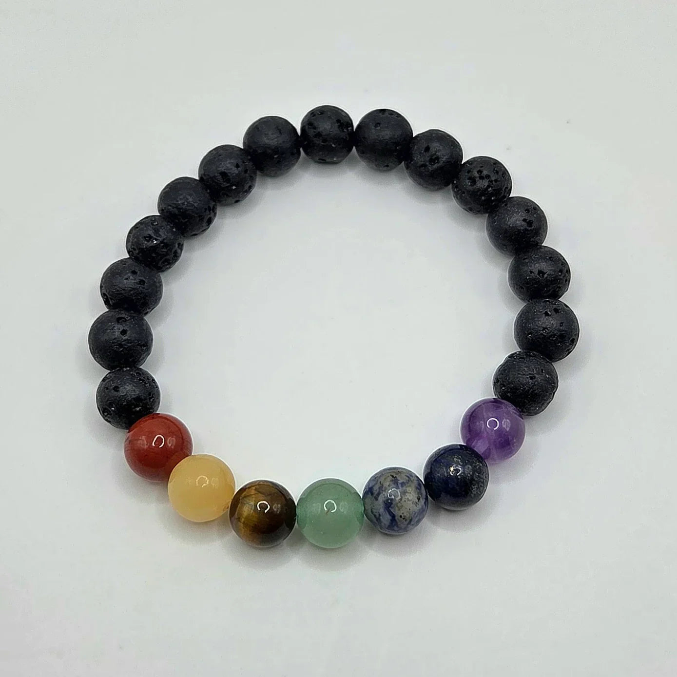 Chakra stone bracelet with lava beads and colorful gemstones for healing and balance