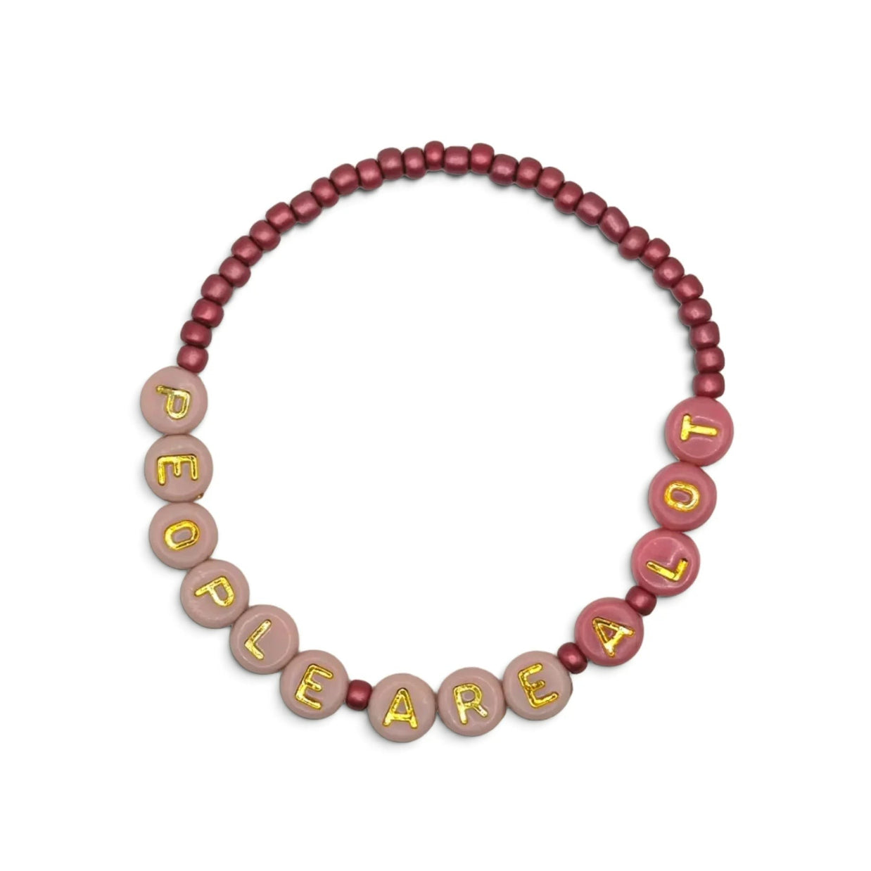 A beaded necklace or bracelet made of round beads, featuring a dark dusty rose beaded section and a lighter dusty pink section with gold lettering spelling out 'PEOPLE ARE A LOT'.
