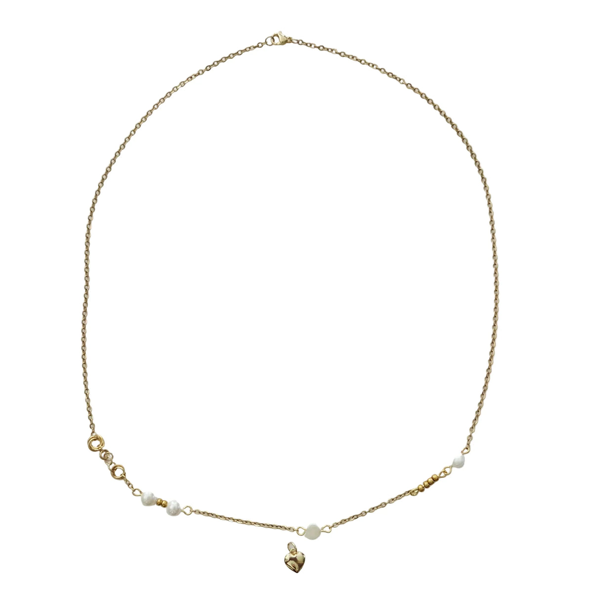 A delicate gold chain necklace featuring small white pearl beads and a small gold heart pendant, displayed on a white background.