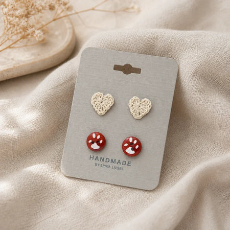 Handmade crochet heart and paw print earrings on display card, cozy handmade gift