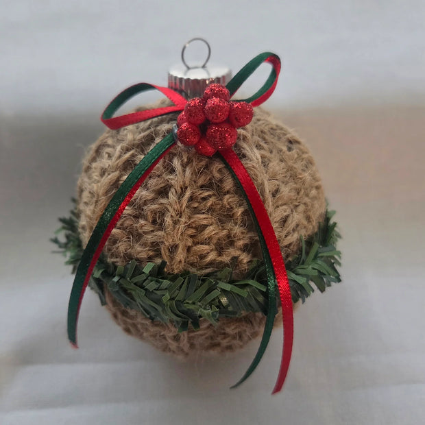 Rustic Christmas ornament with jute twine, red bow, green garland, and glitter berries