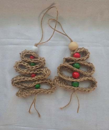 Handmade jute Christmas tree ornaments with red and green beads on white background