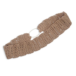 Handmade crochet headband in soft beige, featuring open stitch pattern and white elastic band for comfort.