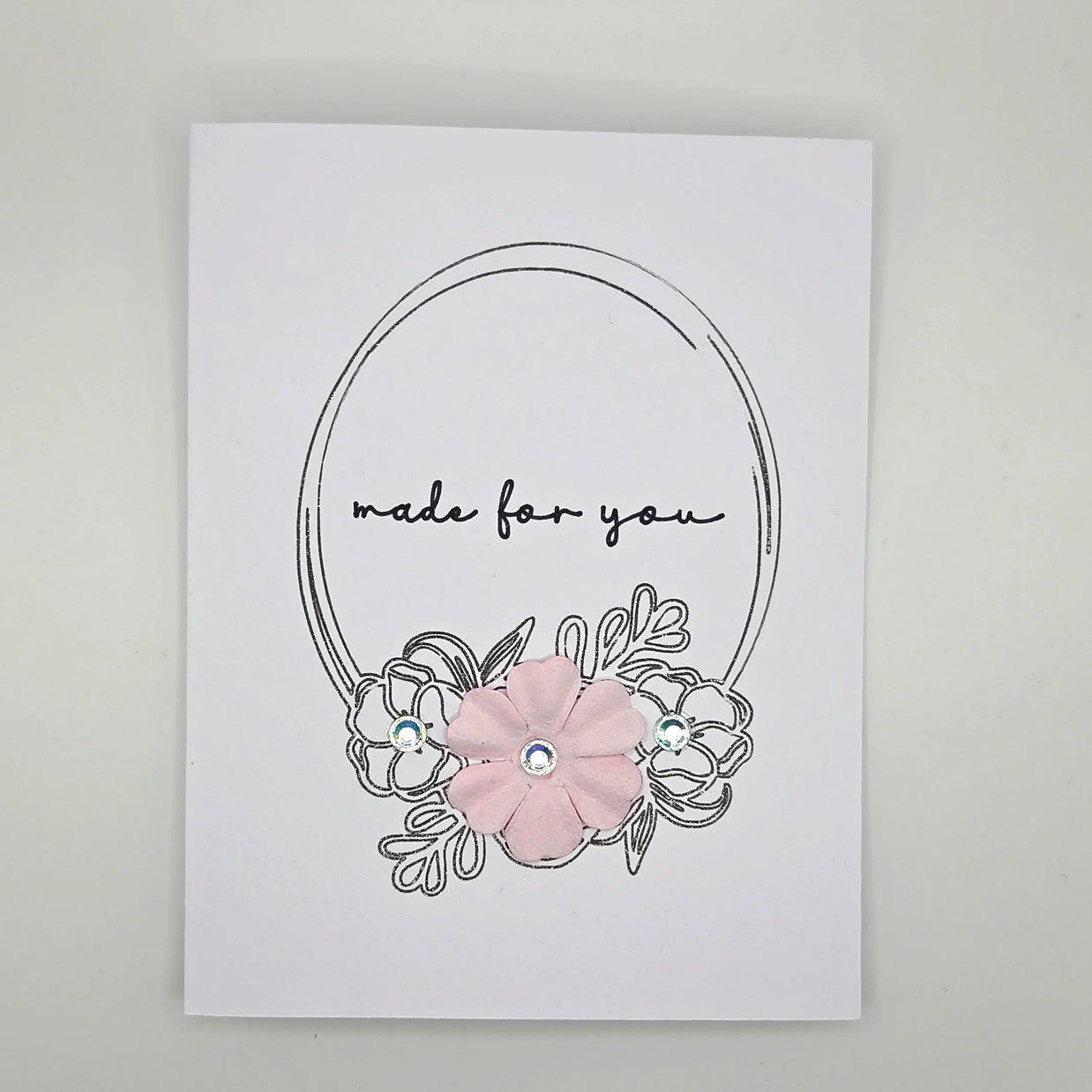 Handmade card with 'made for you' text, pink flower, and rhinestones, perfect for cozy gifts