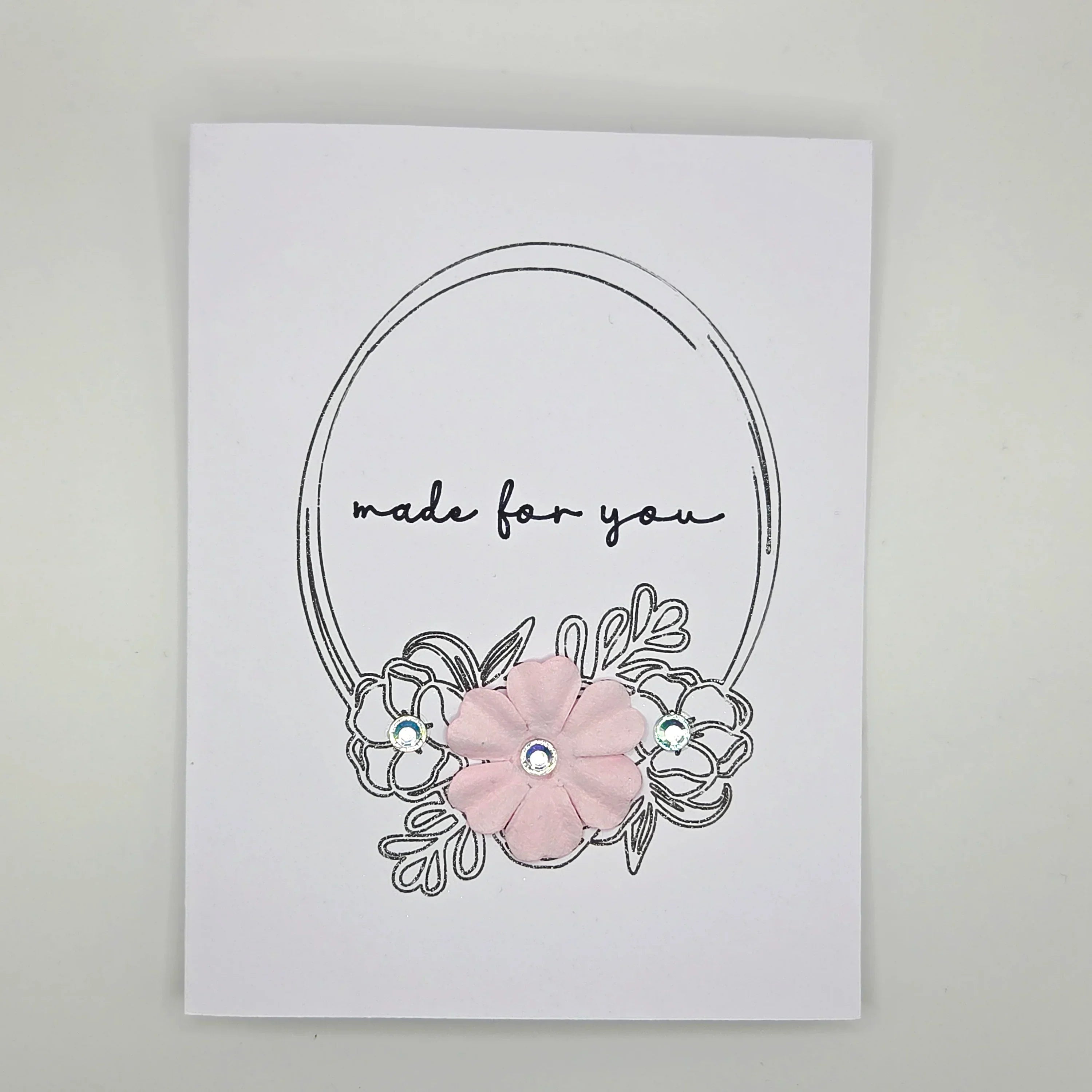 Handmade card with 'made for you' text, pink flower, and rhinestones, perfect for cozy gifts