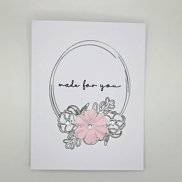 Handmade greeting card with pink flower, rhinestones, and 'made for you' text