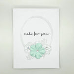 Handmade greeting card with mint flower, silver frame, and 'made for you' text