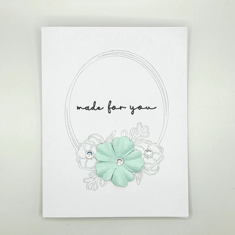 Handmade greeting card with mint flower, silver frame, and 'made for you' text