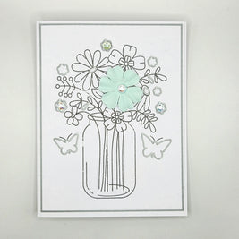 Handmade card with mason jar flower bouquet, pastel flower, rhinestones, and butterfly accents