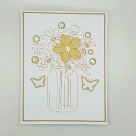 Handmade floral greeting card with yellow flower, butterfly accents, and crystal embellishments