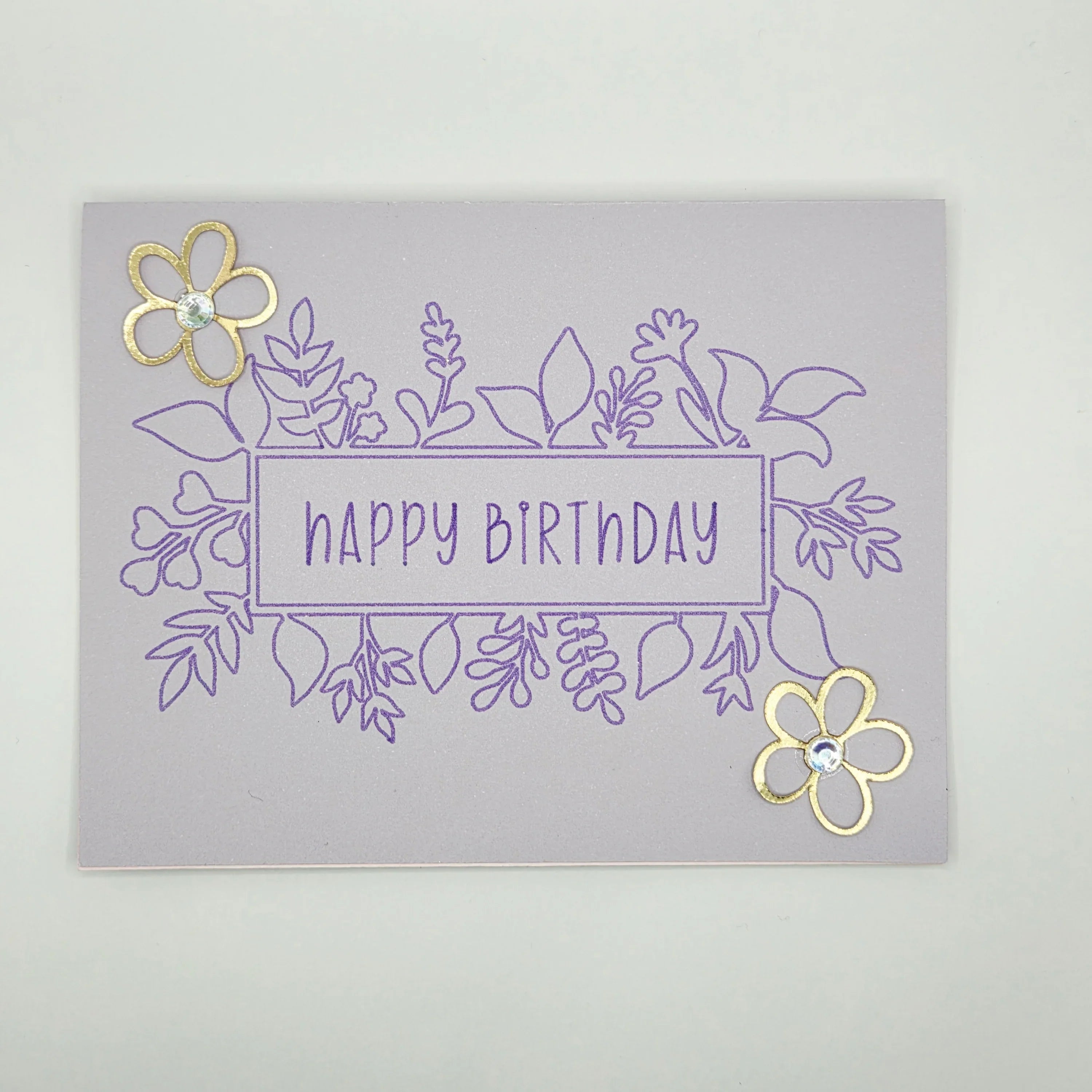 Handmade lavender birthday card with floral line art and gold flower embellishments