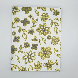 Gold and black hand-drawn floral pattern on handmade white card, Erika Liesel crochet gifts