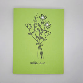 Handmade green greeting card with a black floral bouquet and 'with love' message, embellished with gems.