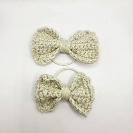 Handmade crochet bow hair ties, cozy and creative accessories for everyday comfort