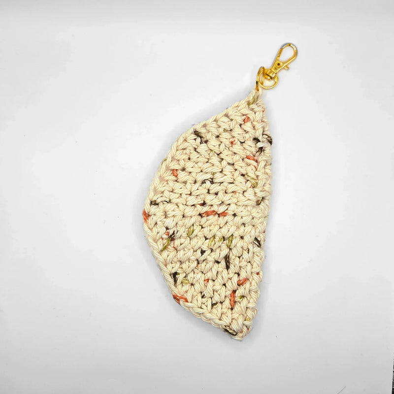 Handmade crochet leaf keychain with speckled yarn and gold clasp
