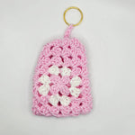 Pink crochet keychain with white flower, handmade cozy gift