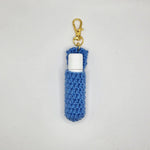 Blue crochet lip balm holder with gold keychain, handmade cozy accessory
