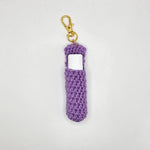 Purple crochet lip balm holder with gold clip, handmade cozy accessory