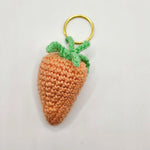 Handmade crochet carrot keychain with green top, cozy amigurumi gift for everyday use