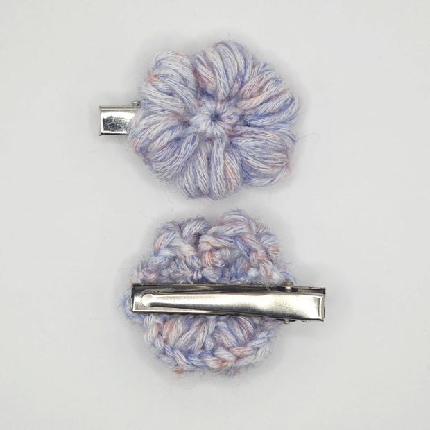 Handmade crochet flower hair clips in pastel yarn by Handmade by Erika Liesel