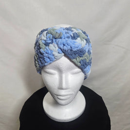 Handmade blue and gray crochet headband on mannequin, cozy crochet gift by Erika Liesel