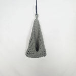 Gray crochet hanging basket, handmade with open stitch pattern, perfect for cozy home decor or gifting.