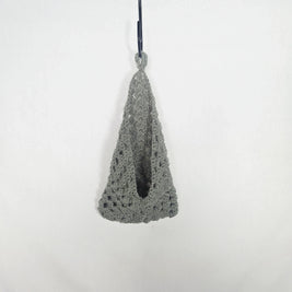 Handmade grey crochet hanging basket by Erika Liesel against a white background