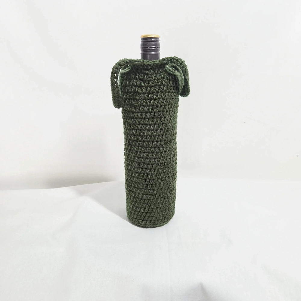 Handmade olive green crochet wine bottle cozy with drawstring, perfect for cozy gifts and creative home decor.