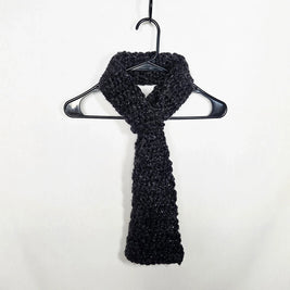 Handmade chunky black crochet scarf on hanger, cozy gift by Erika Liesel