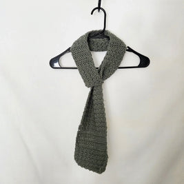 Handmade crochet scarf in grey yarn on hanger, cozy gift by Erika Liesel