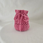 Handmade pink crochet drawstring bag, cozy and creative gift for everyday use