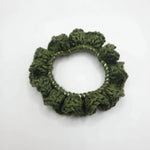 Handmade olive green crochet hair scrunchie with textured ruffles, cozy and stylish hair accessory